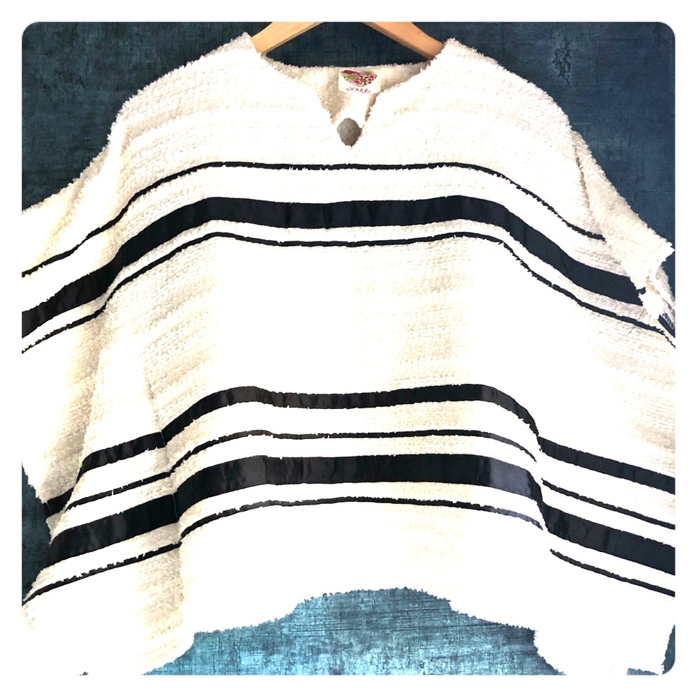 Fuzzy Kiddo by Katie poncho with black stripes